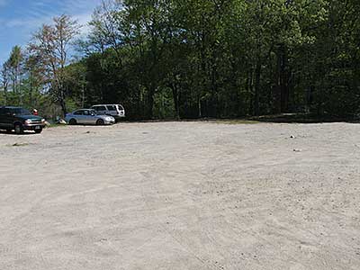 The Large Gravel Parking Lot